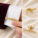 Personalized gold script cufflinks spelling 'Georges&Ahmad' shown on a white dress shirt cuff with a burgundy sleeve, plus two close-up views of the cufflinks on a satin background.